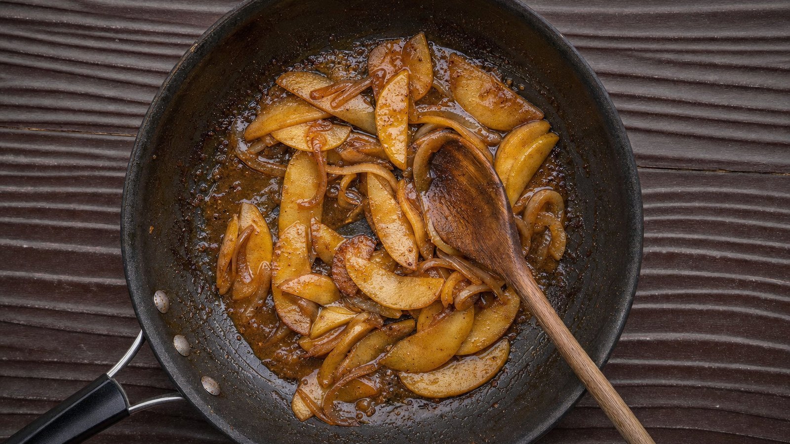 Baked Pork Chops with Apples and Onions: Move the chops to a platter and rest for 5 minutes. Meanwhile, set the skillet over medium heat and simmer the