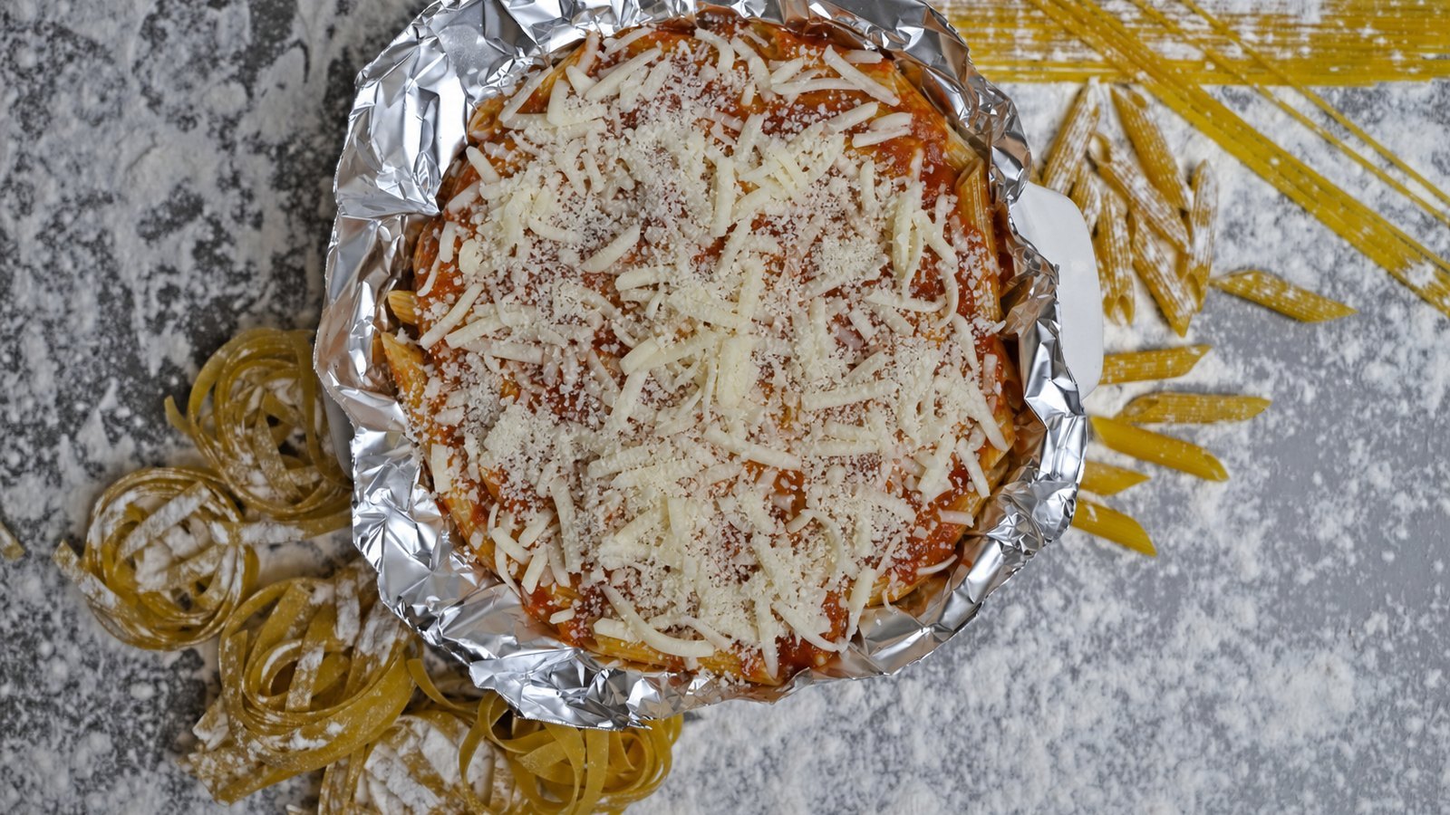 Baked Ziti: Spread half the pasta in the dish. Dollop the ricotta mixture over it and spread gently. Add the remaining pas