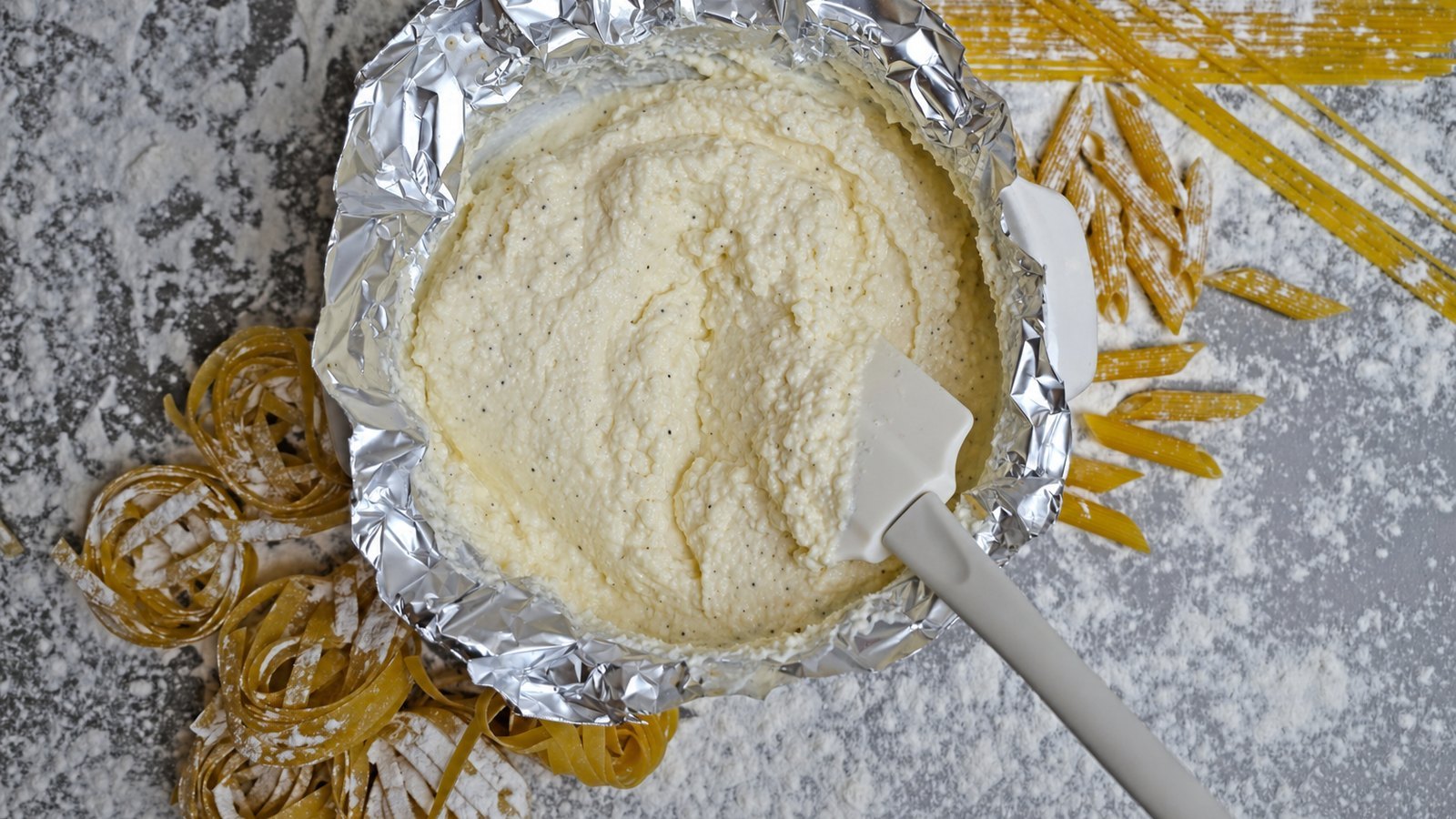 Baked Ziti: Stir together the ricotta, egg, 1/2 cup of the Parmesan, minced garlic, salt and pepper in a bowl