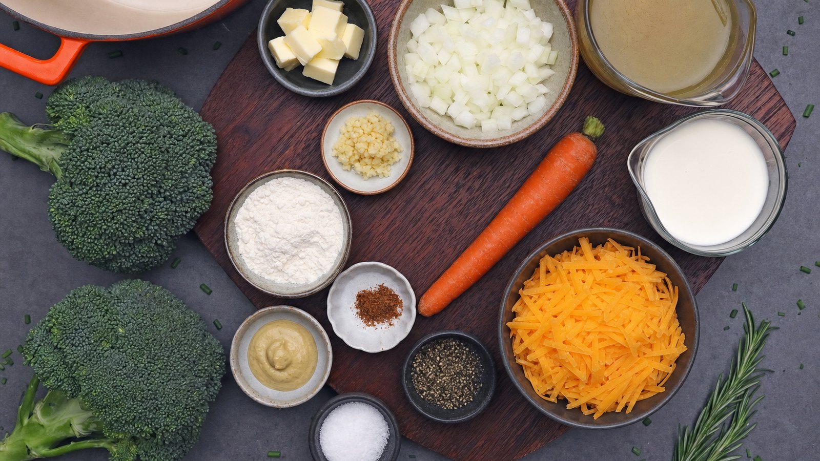 Ingredients for Broccoli Cheddar Soup laid out on the table