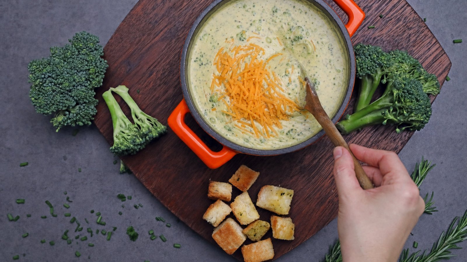 Broccoli Cheddar Soup: With the heat off, add the cheddar a handful at a time, stirring until each addition melts before adding the n