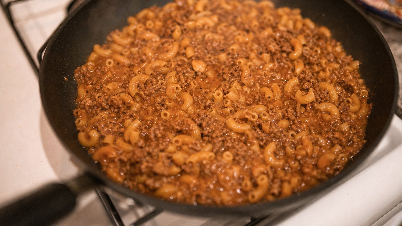 Cheeseburger Skillet: Reduce to a steady simmer, cover and cook 10 to 12 minutes, stirring every 3 to 4 minutes, until the pasta is