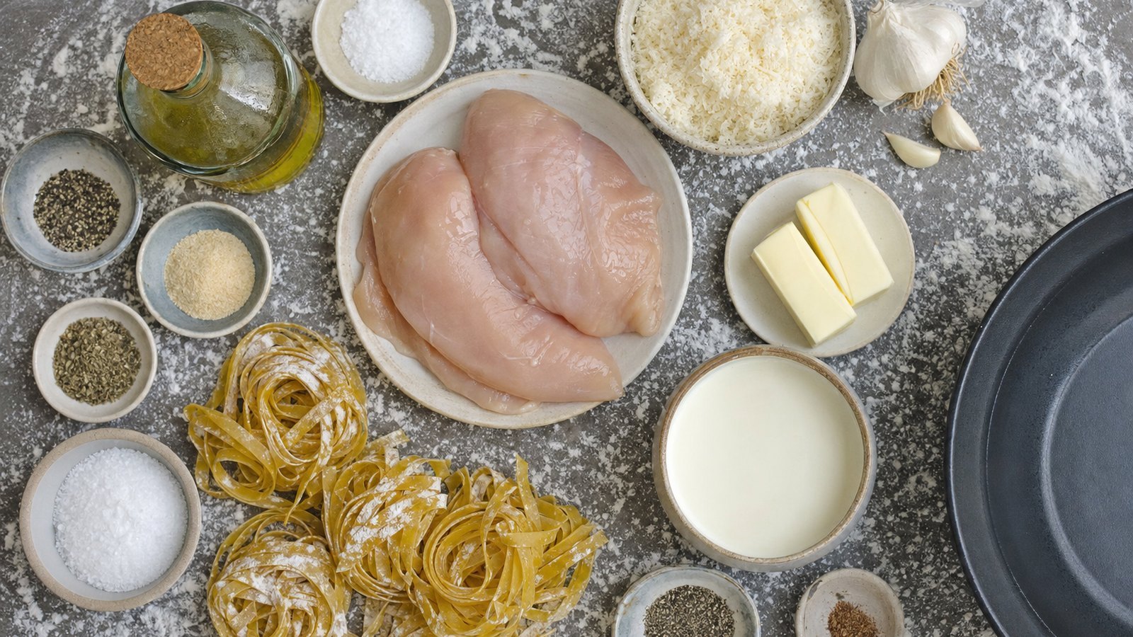 Ingredients for Chicken Alfredo laid out on the table