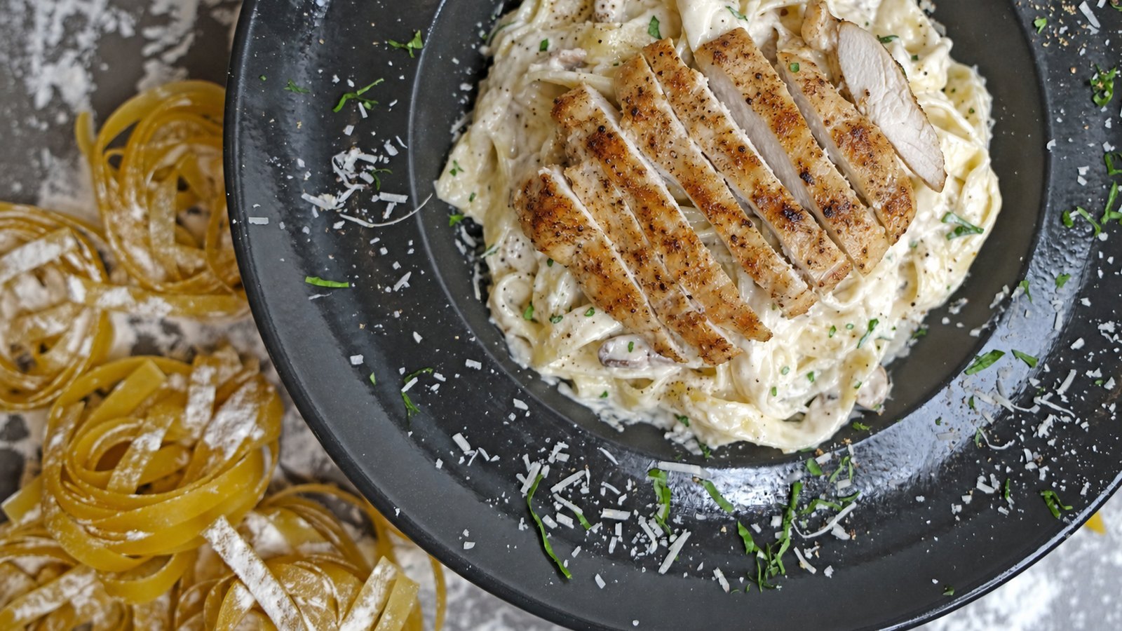 Chicken Alfredo, plated and ready to serve