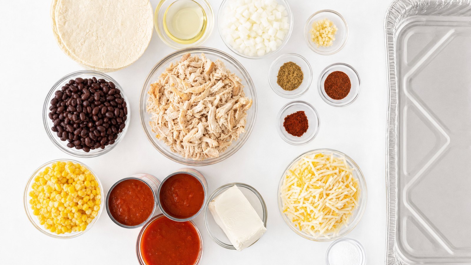 Ingredients for Chicken Enchilada Casserole laid out on the table