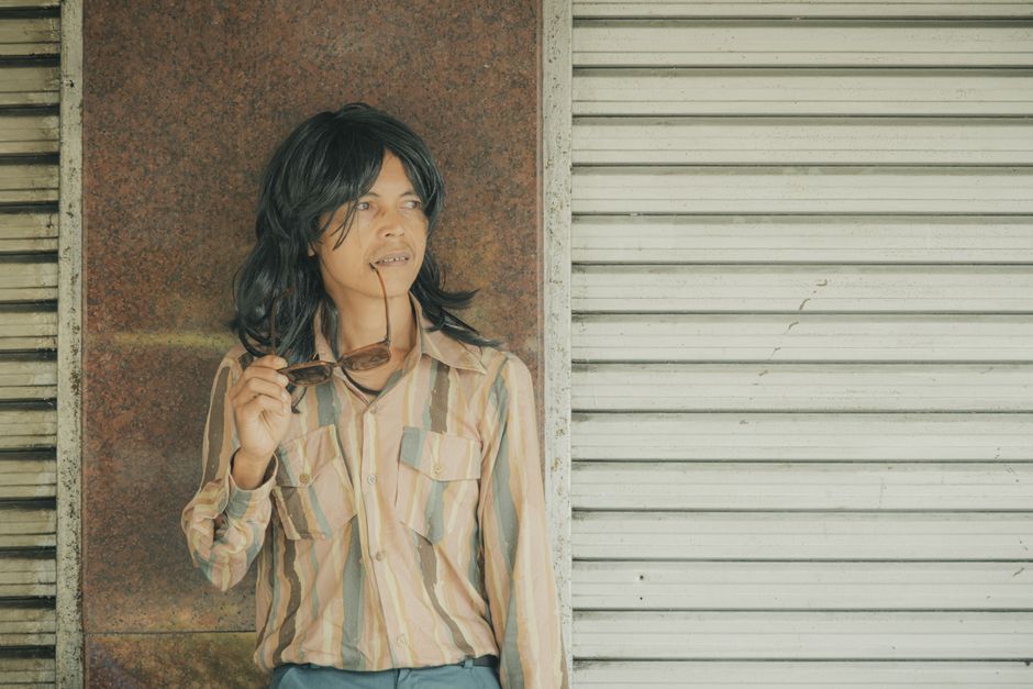 A retro-styled person from a bygone era, embodying the vintage slang culture of decades past.