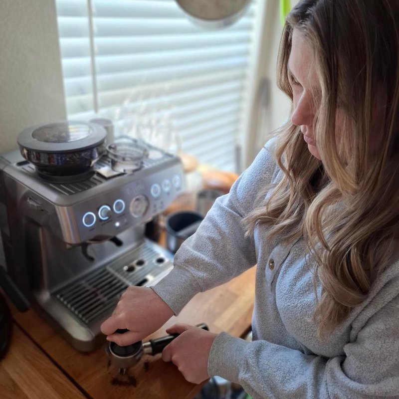 Isabel making espresso at home
