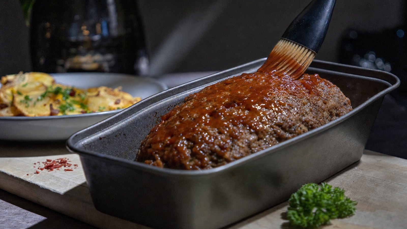 Classic Meatloaf with Brown Sugar Glaze: Bake for 40 minutes. Brush on the remaining glaze and bake for 15 to 25 minutes more, until an instant read th