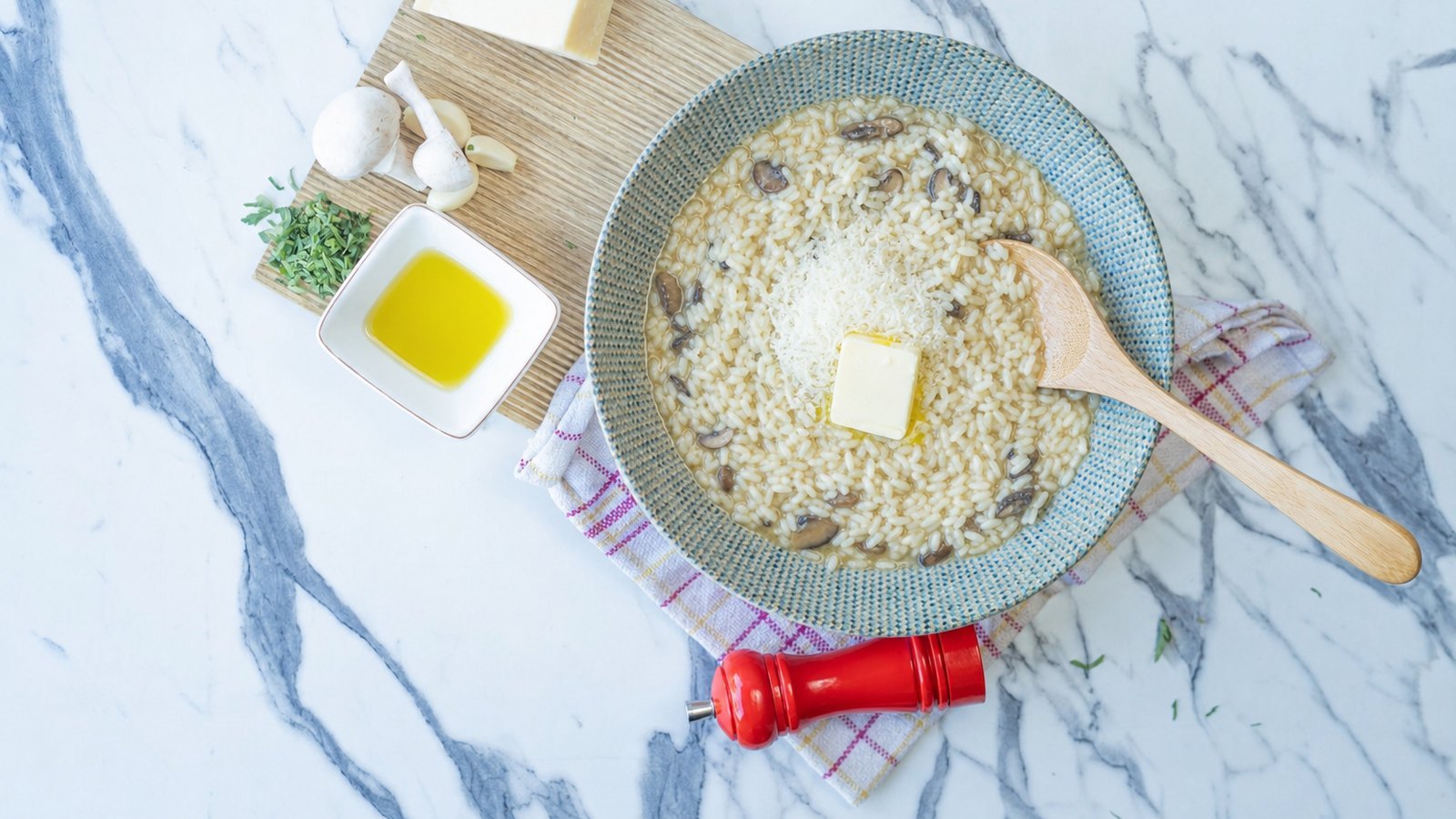 Mushroom Risotto: Remove the pot from the heat. Add the remaining 1 tbsp cold butter, the Parmesan and a splash of the reserved 