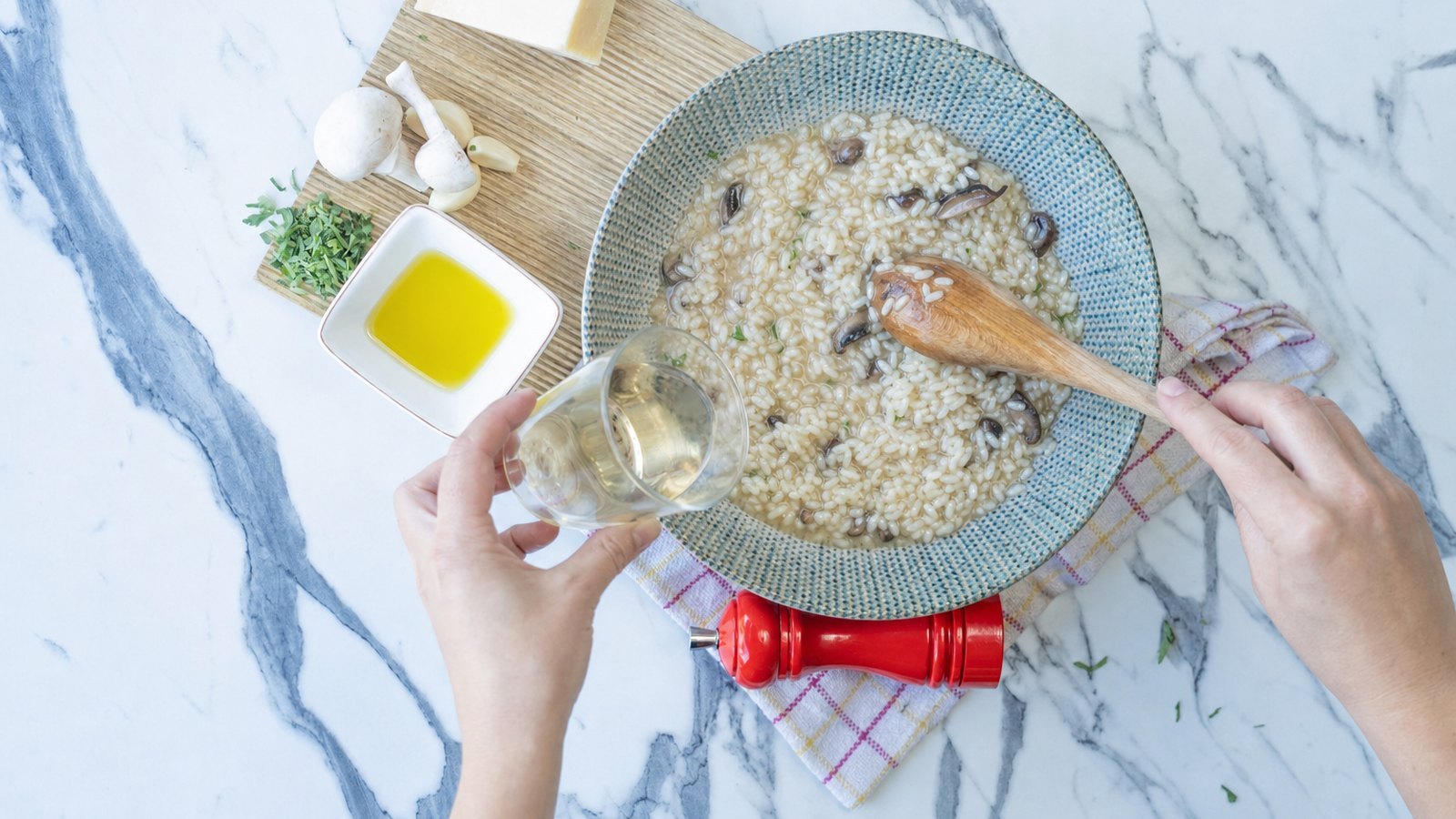 Mushroom Risotto: Pour in the wine and stir until almost fully absorbed, 1 to 2 minutes