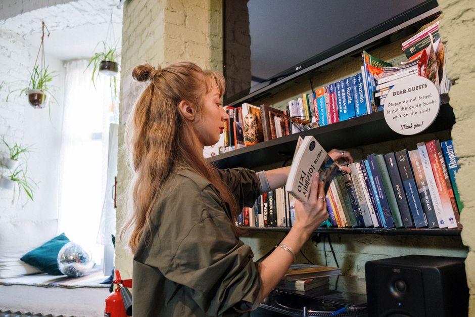 Putting a paperback back on the shelf instead of carrying it in my purse.