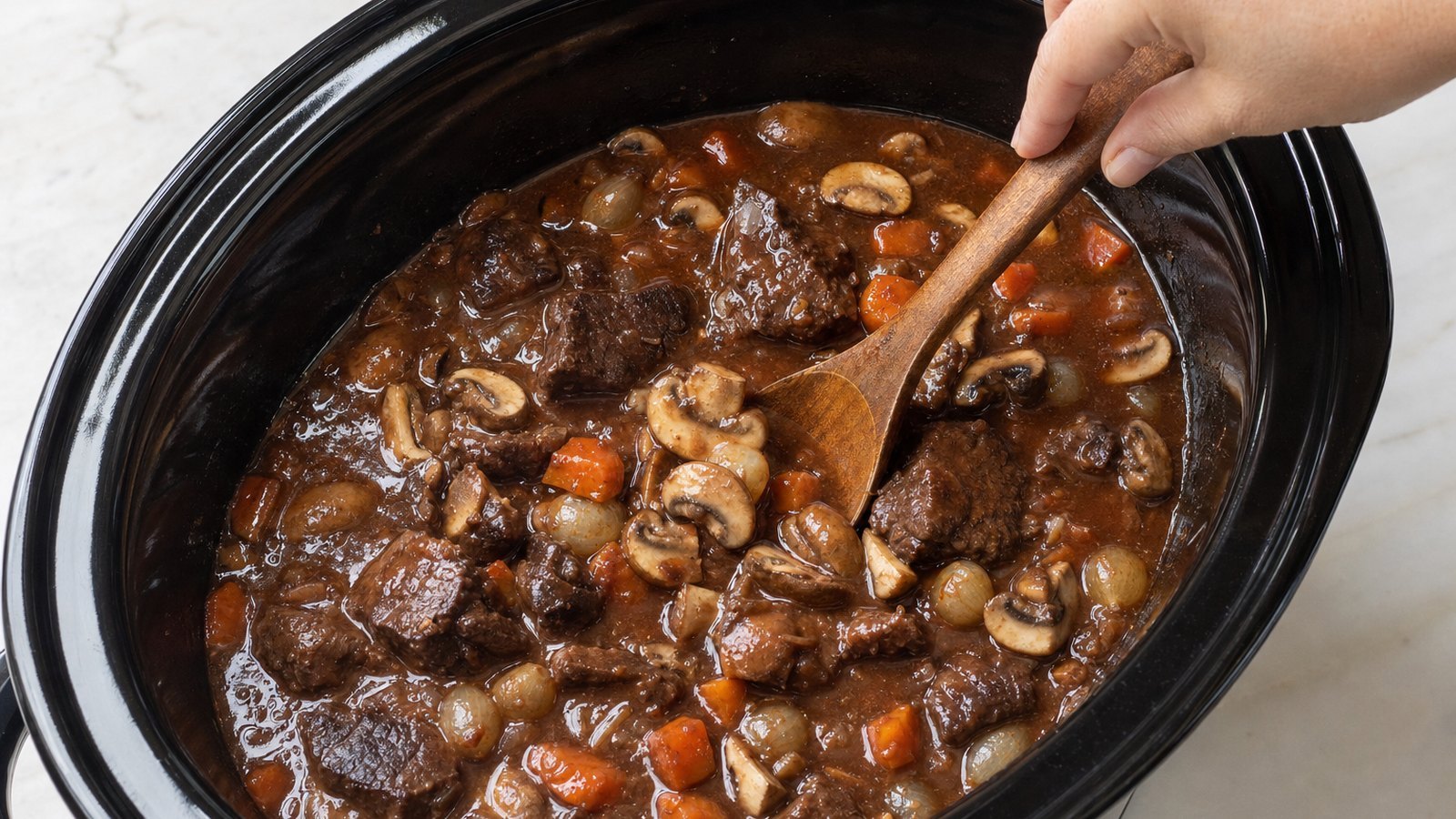 Slow Cooker Beef Bourguignon: Stir the mushrooms into the stew. Remove the bay leaf and thyme stems. Taste and adjust salt and pepper. For a