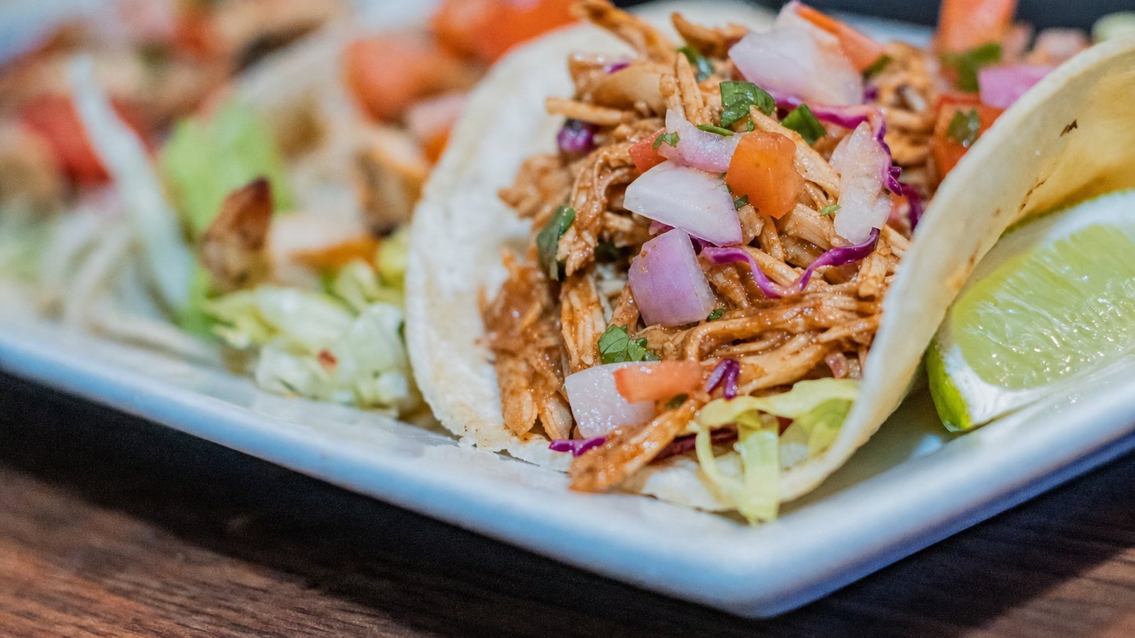 Slow Cooker Chicken Tacos, plated and ready to serve