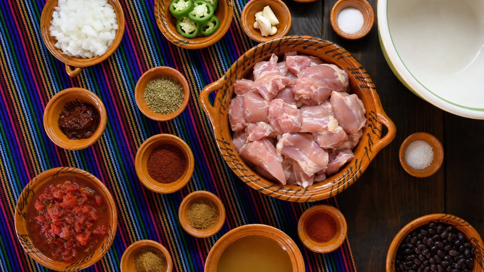 Ingredients for Slow Cooker Chicken Tortilla Soup laid out on the table