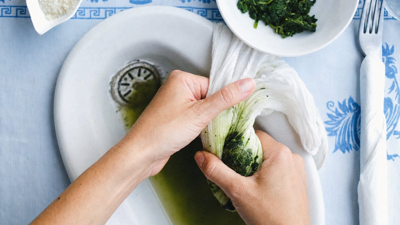 Stuffed Shells with Spinach and Ricotta: Wrap the thawed spinach in a clean kitchen towel and squeeze hard over the sink until almost no liquid comes o
