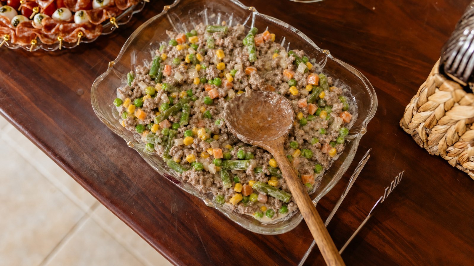 Tater Tot Casserole: Stir in the Worcestershire, Dijon, salt, pepper and frozen vegetables. Taste and adjust the salt